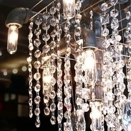 Designer Touch Decorative North American Style Characteristic Crystal 9 Light Chandelier In Pipe Design
